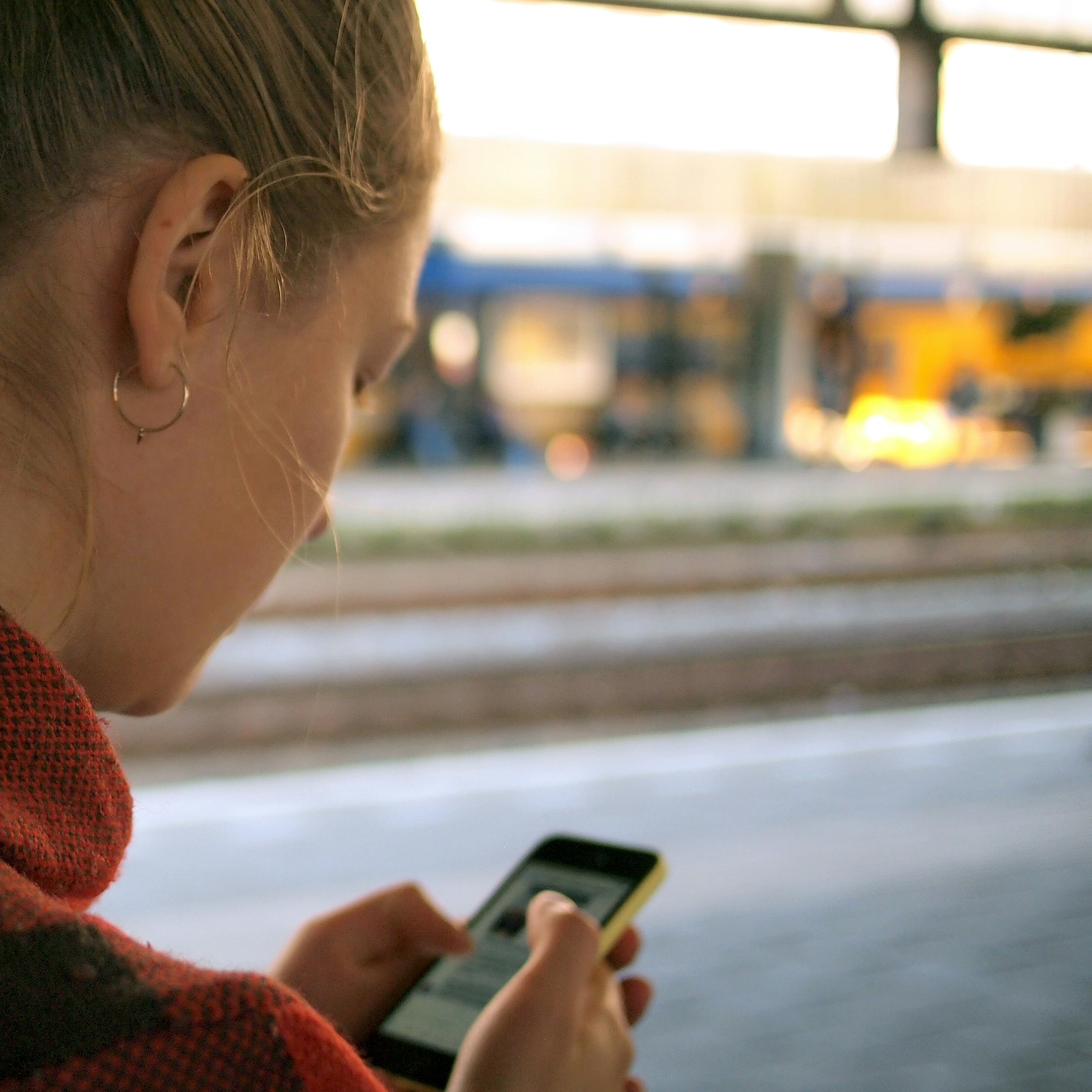 woman using phone outside