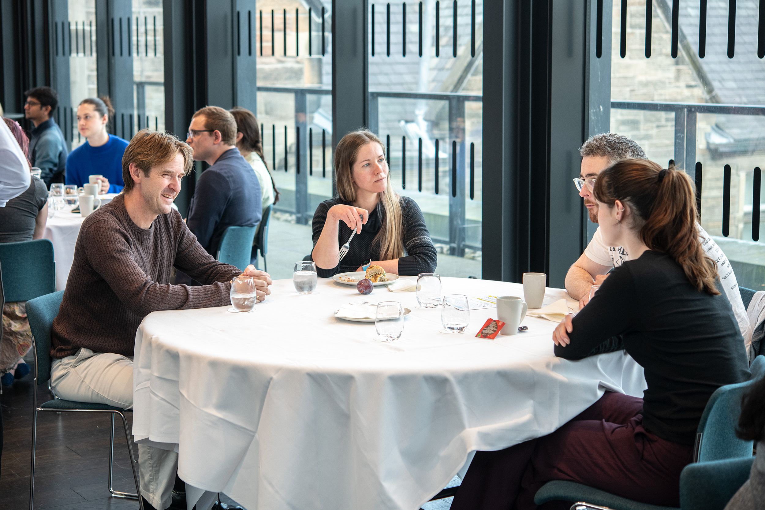 people talking around a table